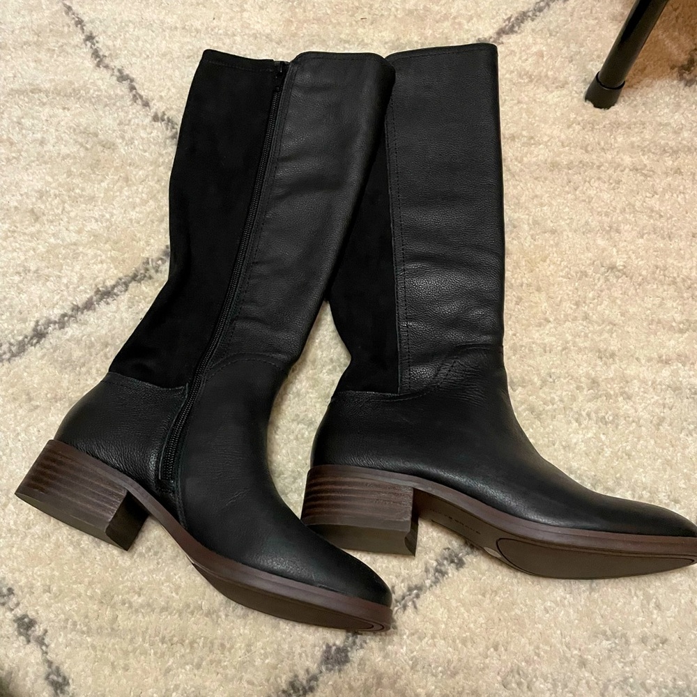 Brand New Black leather boots.